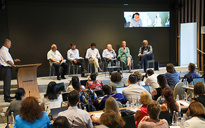 Course participants in panel discussions