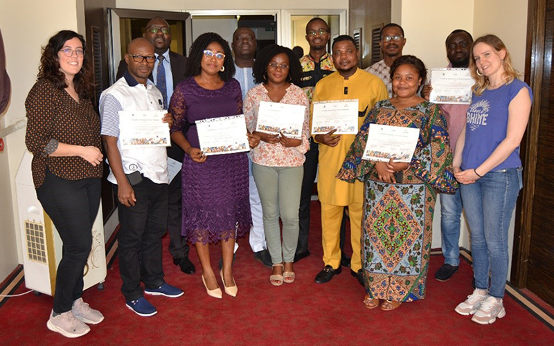 The ten participants and their training certificates.